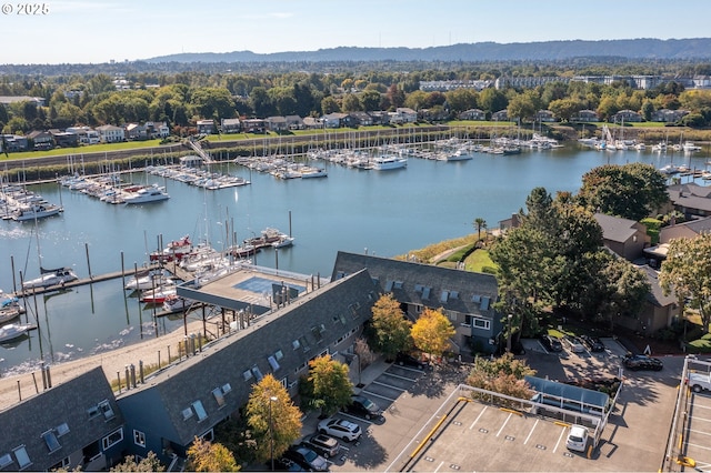 birds eye view of property featuring a water view