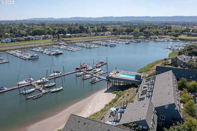 drone / aerial view with a water view