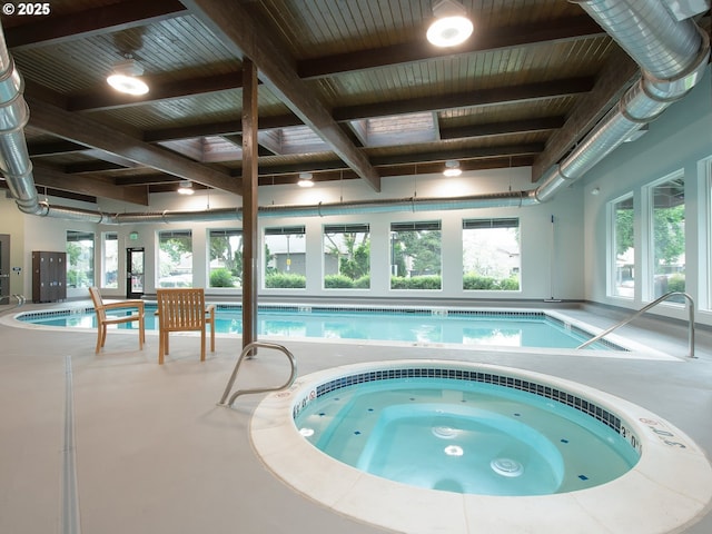 view of pool with an indoor in ground hot tub