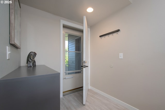 doorway with light hardwood / wood-style floors