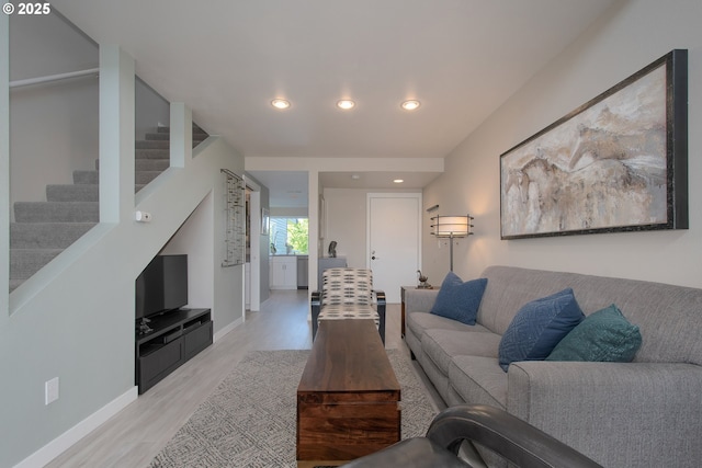 living room with light hardwood / wood-style floors