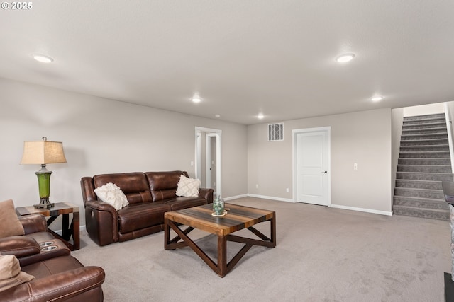 living area featuring stairway, carpet, visible vents, and recessed lighting