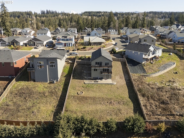 aerial view with a view of trees and a residential view