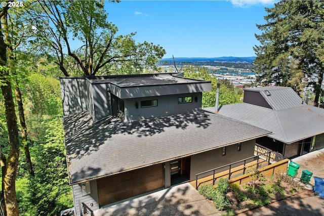view of front of home featuring a mountain view