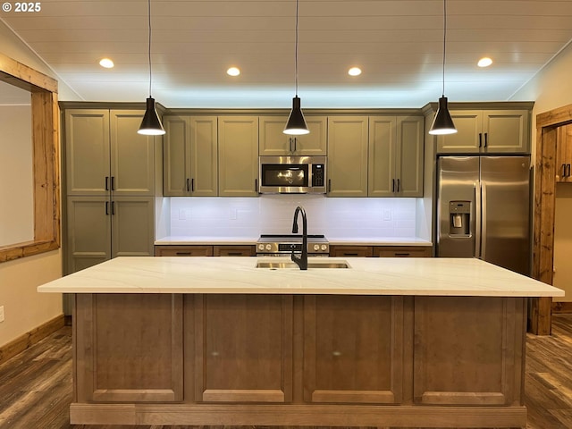 88366 4th Ave, Florence, OR 97439 - kitchen with decorative backsplash, dark wood-style flooring, recessed lighting, appliances with stainless steel finishes, and hanging light fixtures