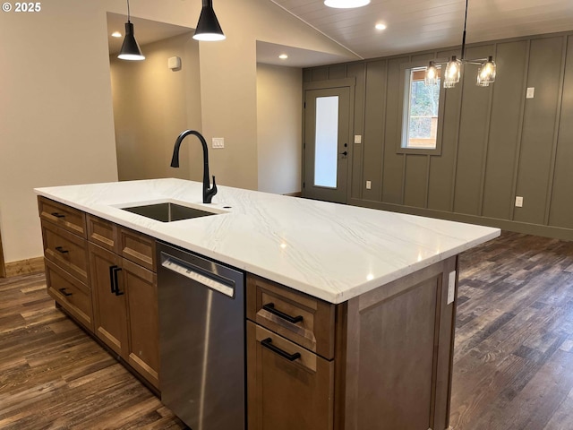 88366 4th Ave, Florence, OR 97439 - kitchen with stainless steel dishwasher, decorative light fixtures, dark wood finished floors, and a sink