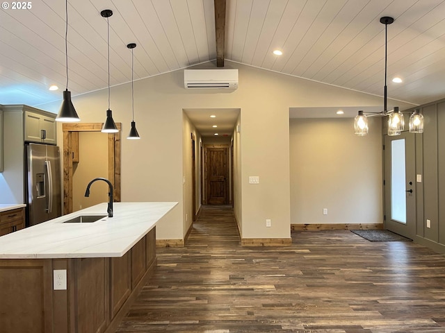 88366 4th Ave, Florence, OR 97439 - kitchen with recessed lighting, a sink, stainless steel fridge, lofted ceiling with beams, and dark wood-style floors