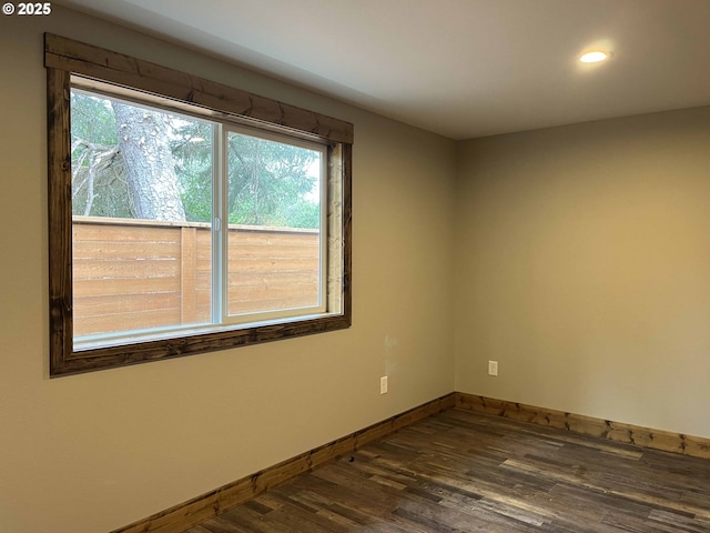 88366 4th Ave, Florence, OR 97439 - spare room with recessed lighting, baseboards, and dark wood-style floors