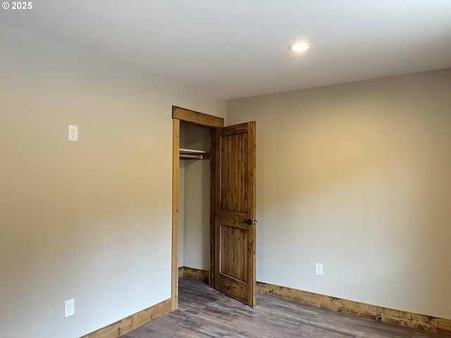88366 4th Ave, Florence, OR 97439 - unfurnished bedroom featuring recessed lighting, baseboards, wood finished floors, and a closet