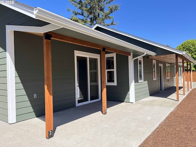 88366 4th Ave, Florence, OR 97439 - rear view of house featuring a patio