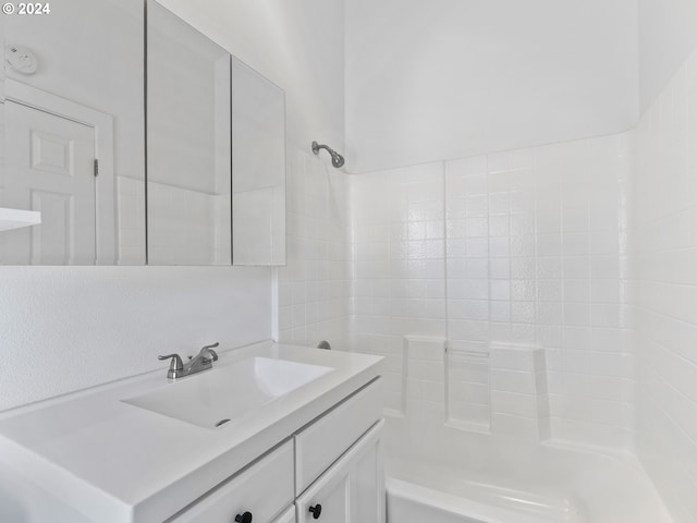 bathroom featuring vanity and shower / bathing tub combination