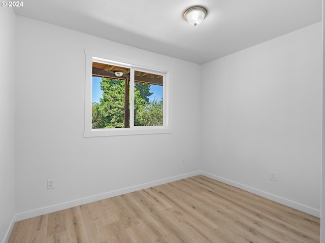 empty room with light wood-type flooring