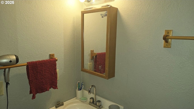 bathroom featuring sink