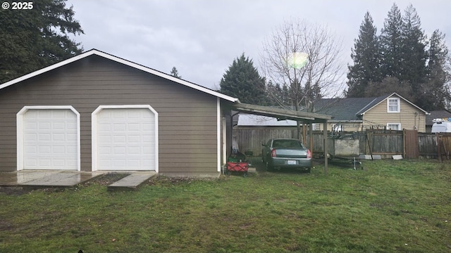 garage with a lawn