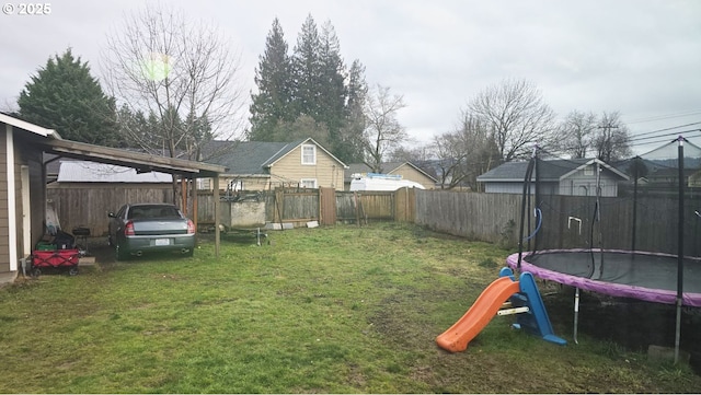 view of yard featuring a trampoline