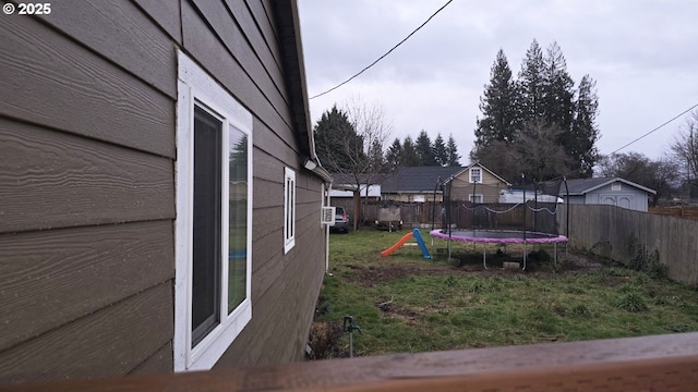 view of yard featuring a trampoline