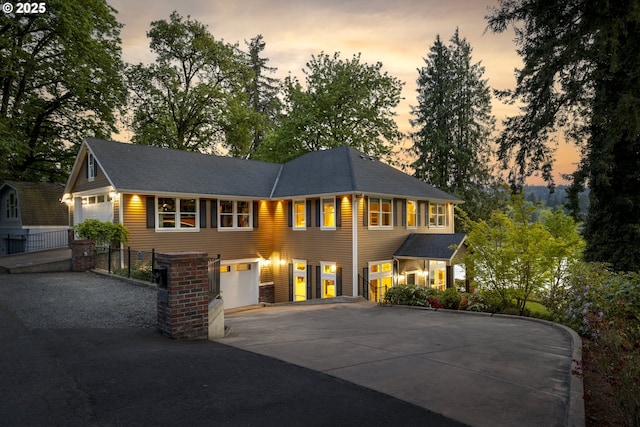 view of front of property with concrete driveway