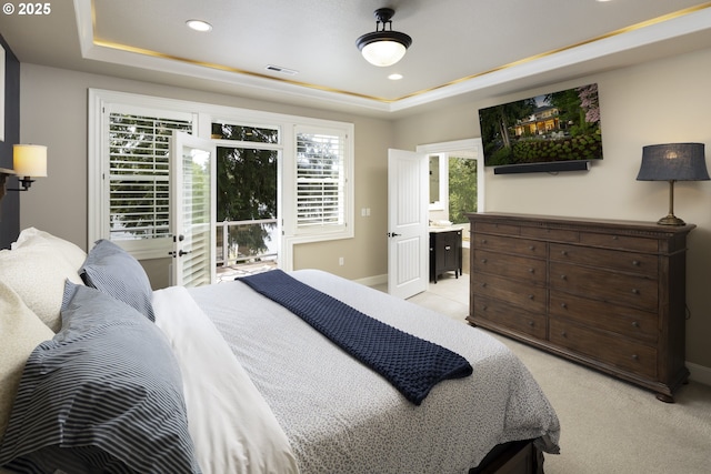 bedroom with recessed lighting, a raised ceiling, baseboards, and light carpet