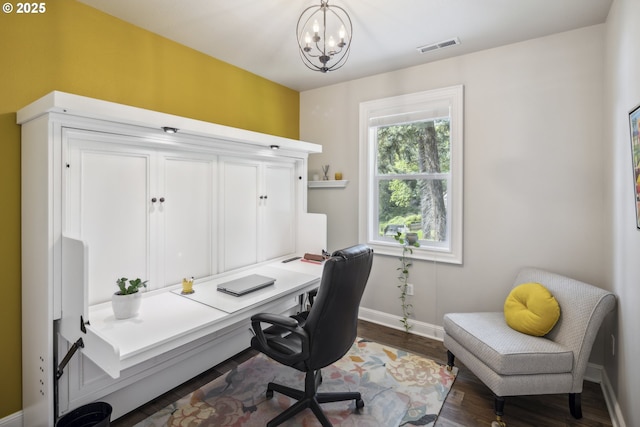 office area featuring baseboards, dark wood finished floors, a notable chandelier, and visible vents