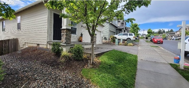 view of home's exterior featuring crawl space, a residential view, and fence