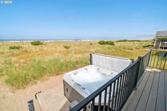 26280 Beach Dr, Rockaway Beach, OR 97136 - wooden terrace featuring a hot tub and a water view