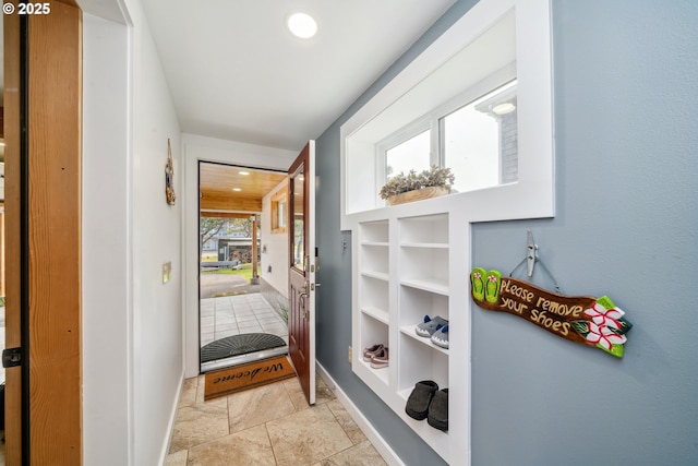 26280 Beach Dr, Rockaway Beach, OR 97136 - entryway with light stone finish flooring and recessed lighting