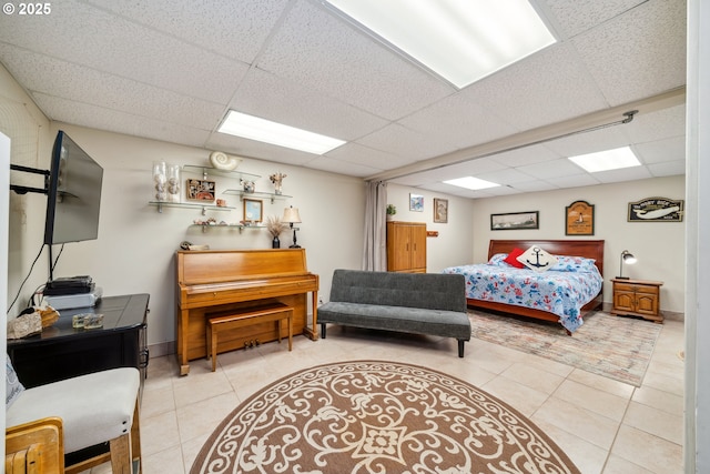 26280 Beach Dr, Rockaway Beach, OR 97136 - bedroom with a drop ceiling and tile patterned flooring