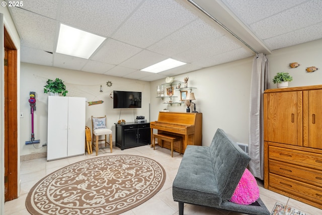 26280 Beach Dr, Rockaway Beach, OR 97136 - living area with a drop ceiling and tile patterned floors