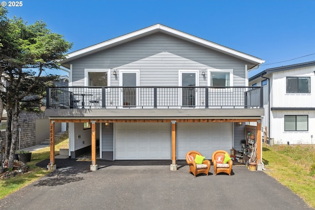 26280 Beach Dr, Rockaway Beach, OR 97136 - view of front facade with driveway and an attached garage