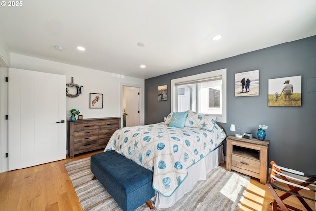26280 Beach Dr, Rockaway Beach, OR 97136 - bedroom with wood finished floors and recessed lighting