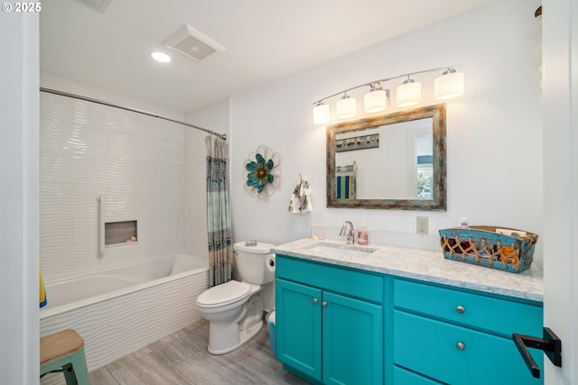 26280 Beach Dr, Rockaway Beach, OR 97136 - bathroom with vanity, shower / bath combo with shower curtain, wood finished floors, and recessed lighting