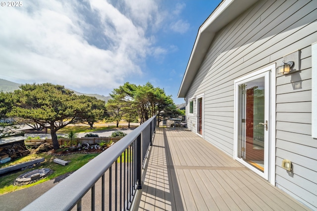 26280 Beach Dr, Rockaway Beach, OR 97136 - wooden terrace with a mountain view
