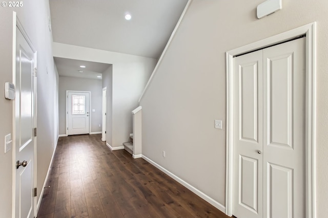 foyer featuring recessed lighting, stairway, baseboards, and dark wood-style floors