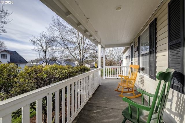 balcony featuring covered porch