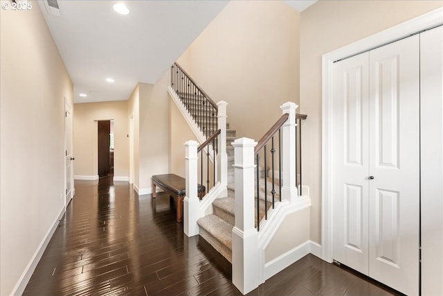 17202 NW Viola St, Portland, OR 97229 - stairs with wood finished floors, baseboards, and recessed lighting