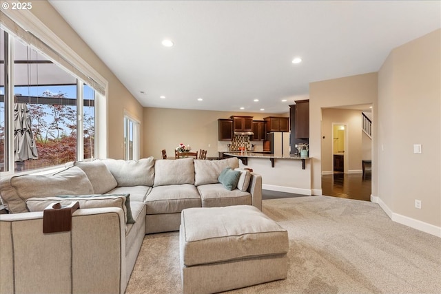 17202 NW Viola St, Portland, OR 97229 - living room featuring light colored carpet, baseboards, and recessed lighting