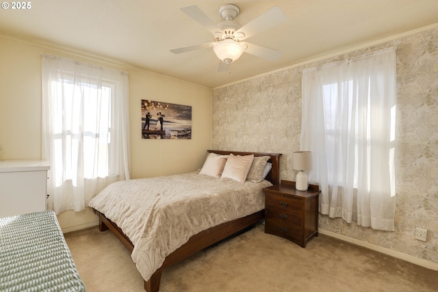 5704 Keene Rd NE, Gervais, OR 97026 - bedroom with light carpet, ornamental molding, ceiling fan, wallpapered walls, and baseboards