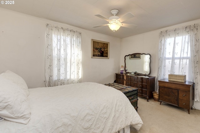 5704 Keene Rd NE, Gervais, OR 97026 - carpeted bedroom featuring multiple windows, crown molding, and a ceiling fan