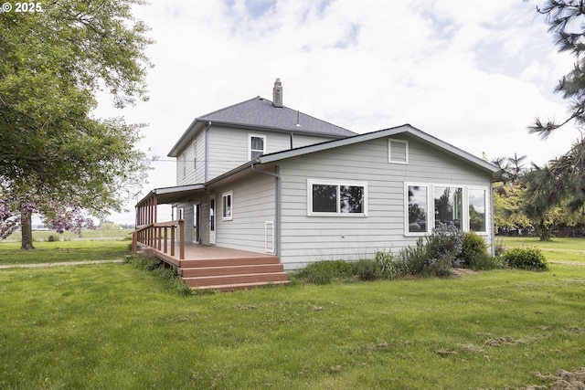 5704 Keene Rd NE, Gervais, OR 97026 - back of property featuring a wooden deck, a chimney, and a yard
