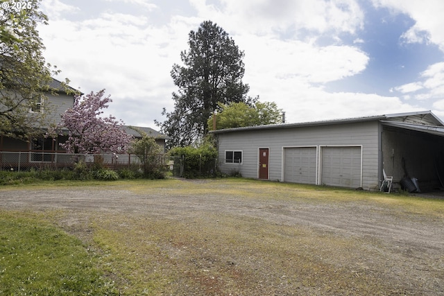 5704 Keene Rd NE, Gervais, OR 97026 - view of yard with an outdoor structure, driveway, and a garage