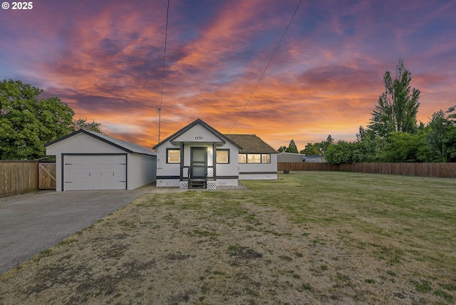1570 Blaine St, Woodburn, OR 97071 - view of front of house with driveway and a detached garage