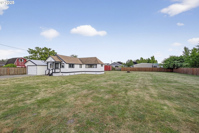 1570 Blaine St, Woodburn, OR 97071 - fenced backyard with an outdoor structure and a detached garage