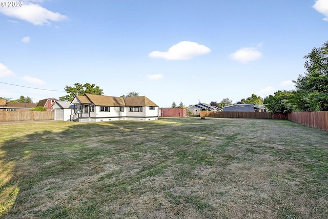 1570 Blaine St, Woodburn, OR 97071 - fenced backyard featuring a storage unit