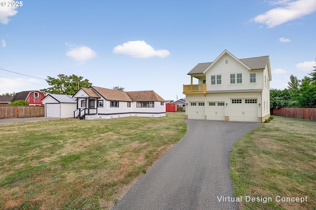 1570 Blaine St, Woodburn, OR 97071 - view of front facade featuring an attached garage, driveway, an outbuilding, and a balcony