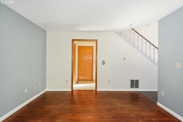 1904 Quinton St, The Dalles, OR 97058 - unfurnished living room featuring wood finished floors, stairs, and baseboards
