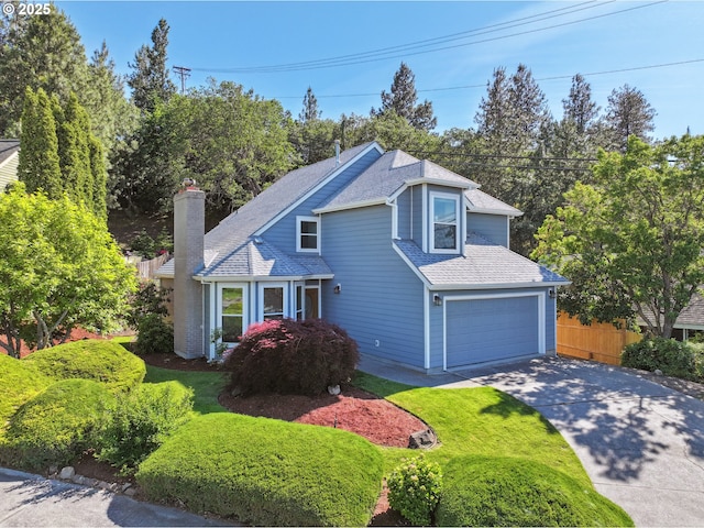 1904 Quinton St, The Dalles, OR 97058 - view of front facade with driveway, a chimney, an attached garage, and a shingled roof