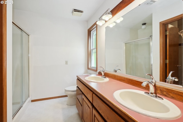 1904 Quinton St, The Dalles, OR 97058 - full bath with a stall shower, double vanity, toilet, and tile patterned floors