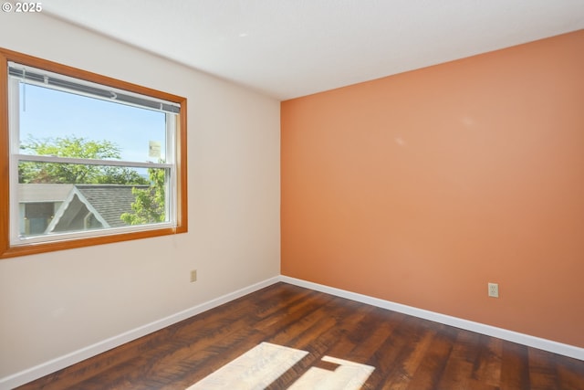 1904 Quinton St, The Dalles, OR 97058 - spare room featuring baseboards and dark wood-style flooring