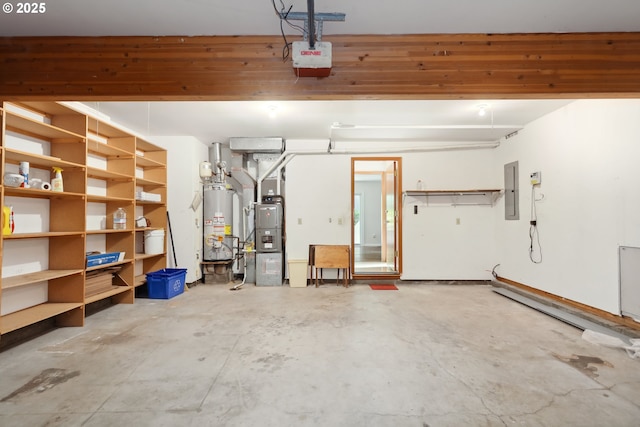 1904 Quinton St, The Dalles, OR 97058 - garage featuring gas water heater, a garage door opener, and electric panel