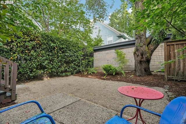 view of patio / terrace with fence